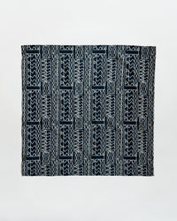 Black and white patterned fabric on a light gray background