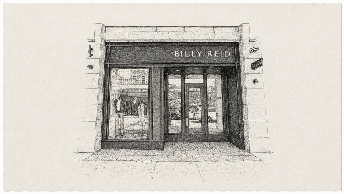 A black and white architectural sketch of a storefront with the text 'BILLY REID' above the entrance, shown on a plain light background.