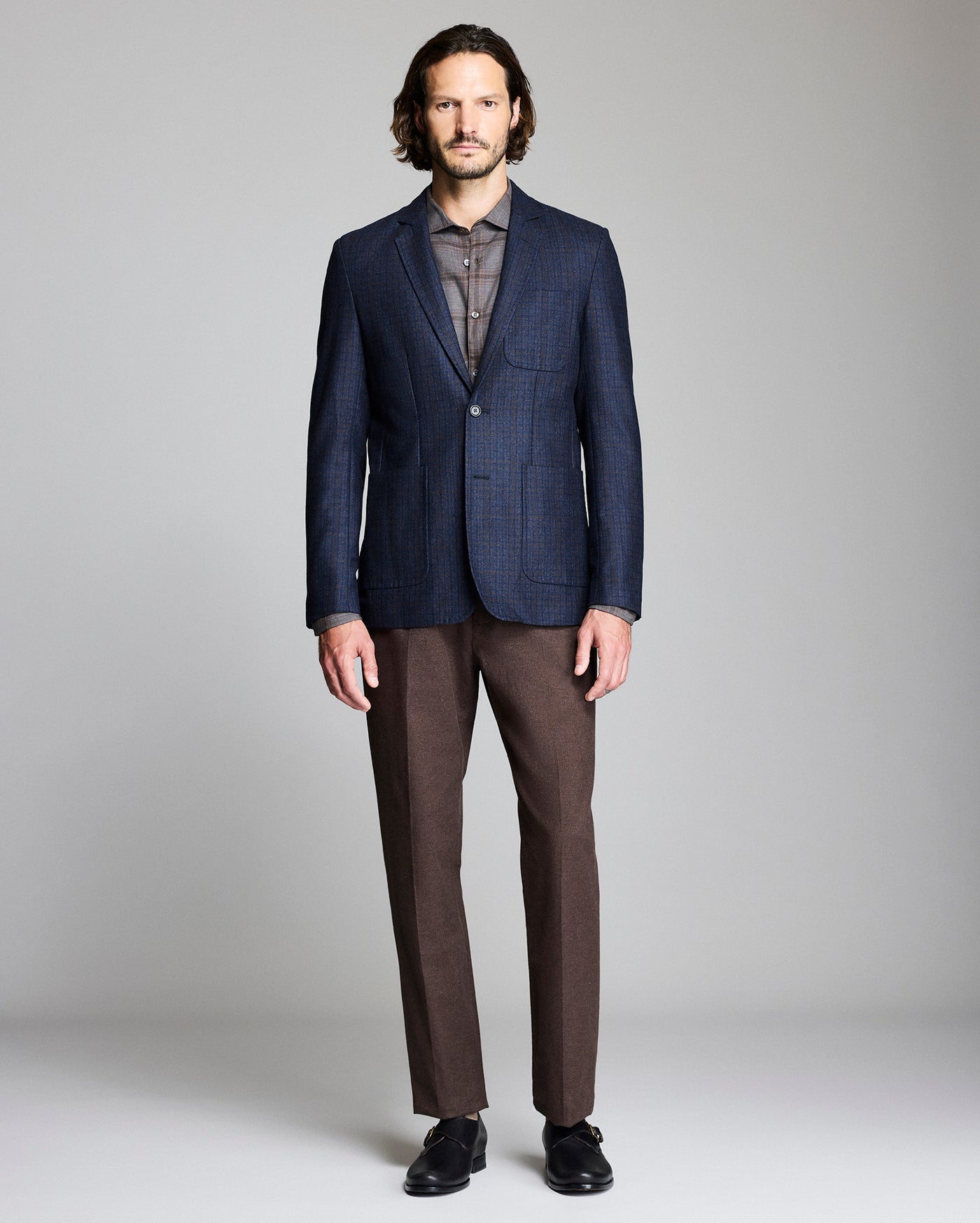 Model shows the fit of the Virgin Wool Plaid Archie Jacket