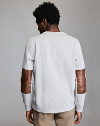 Back of the sweatshirt, showing off the leather elbow patches.