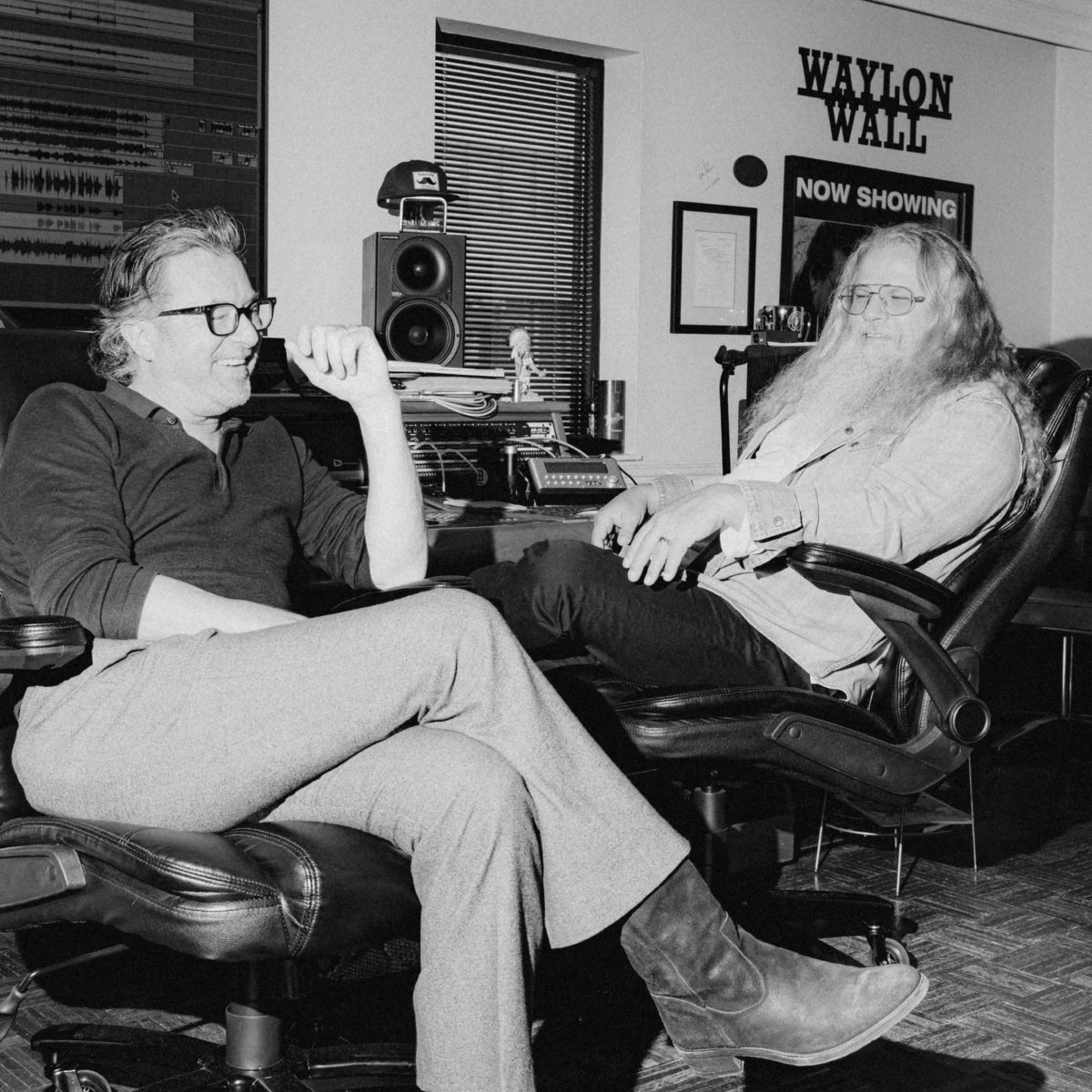 Billy Reid and Jamey Johnson have a jovial conversation as they sit in Mr. Johnson's studio.