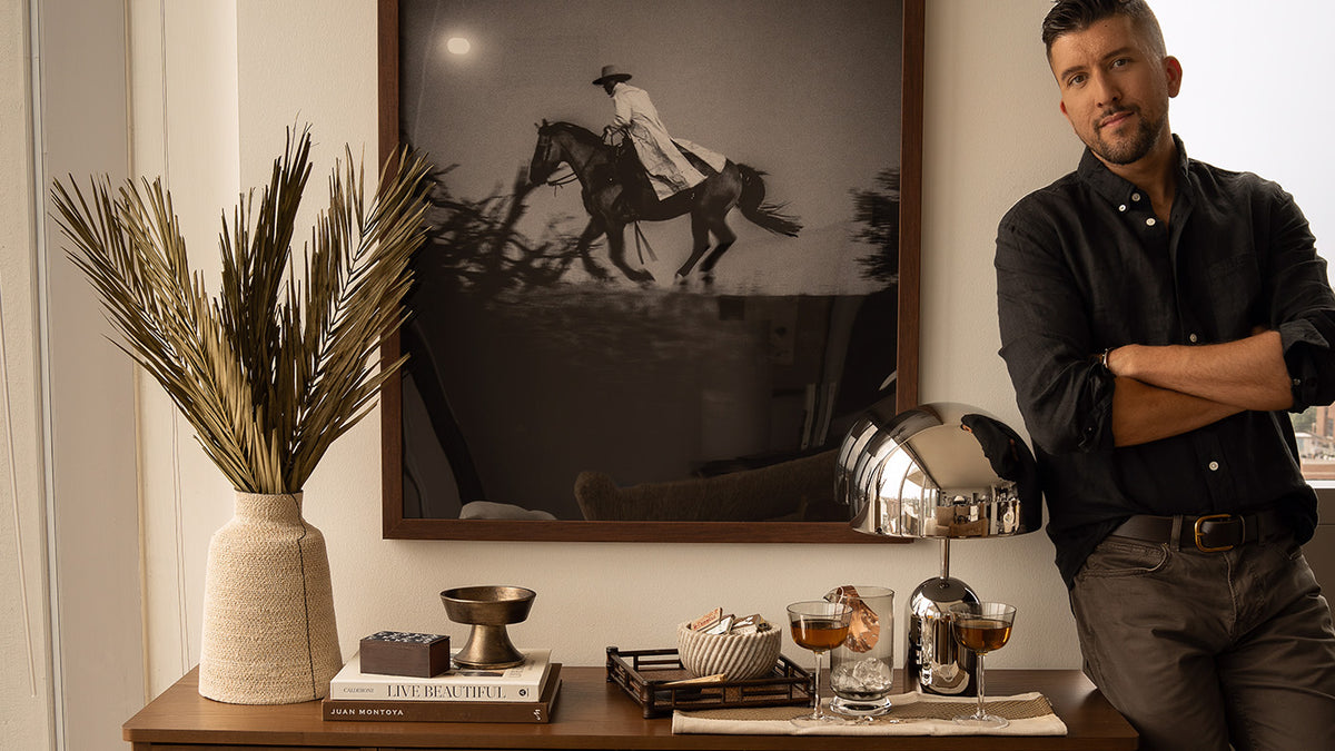Thomas Trust stands next to tastefully arranged decor.