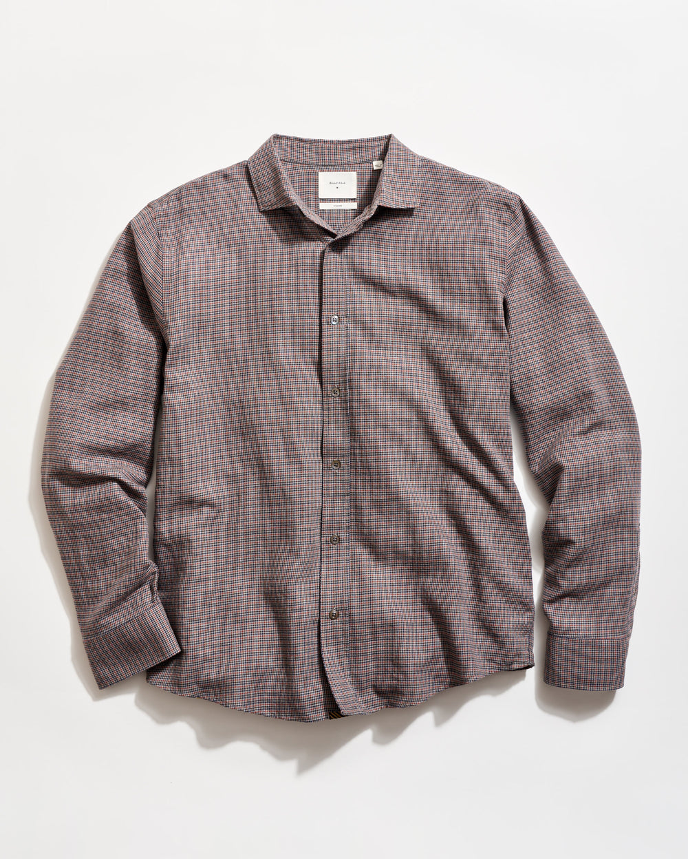 Plaid shirt on a light gray background