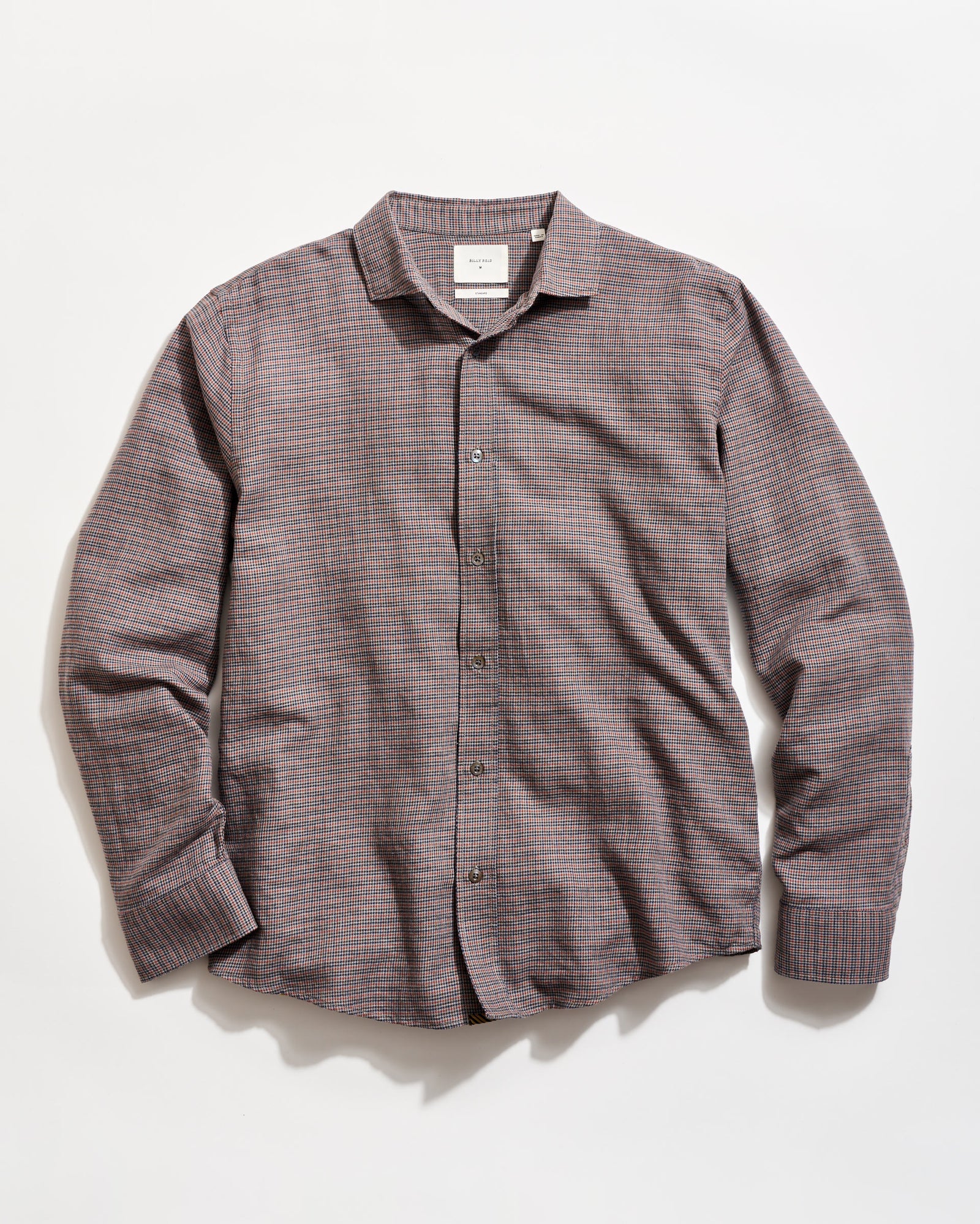 Plaid shirt on a light gray background