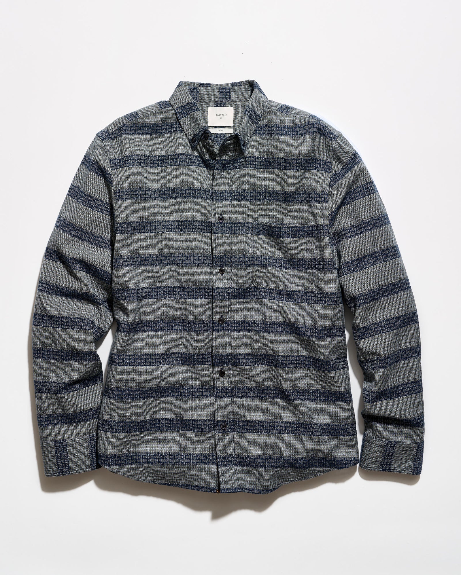 A long-sleeve button-up shirt with a textured gray and navy blue horizontal stripe pattern, laid flat against a white background.