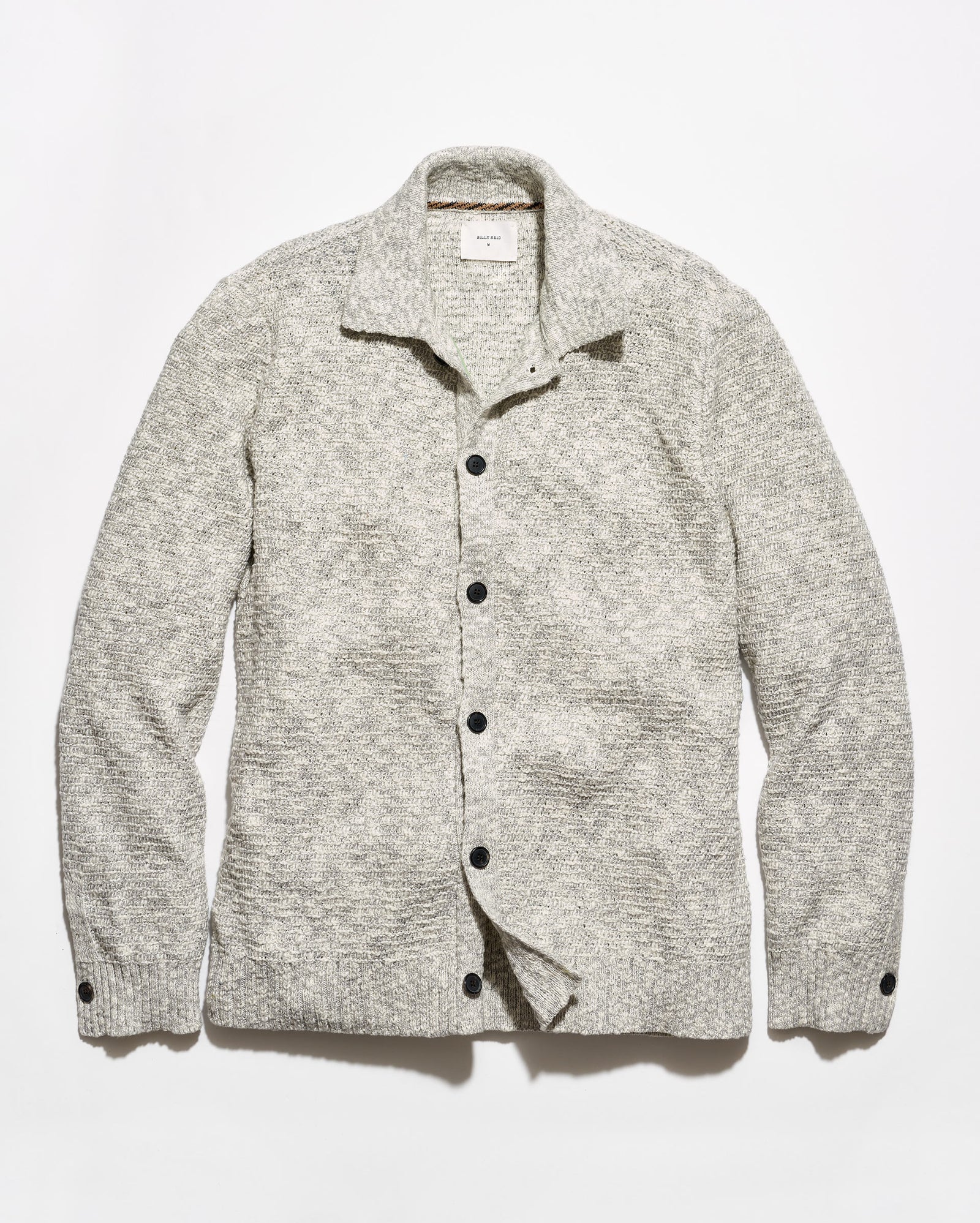 A light gray and white heathered knit cardigan sweater with a collar and dark buttons, laid flat against a white background.