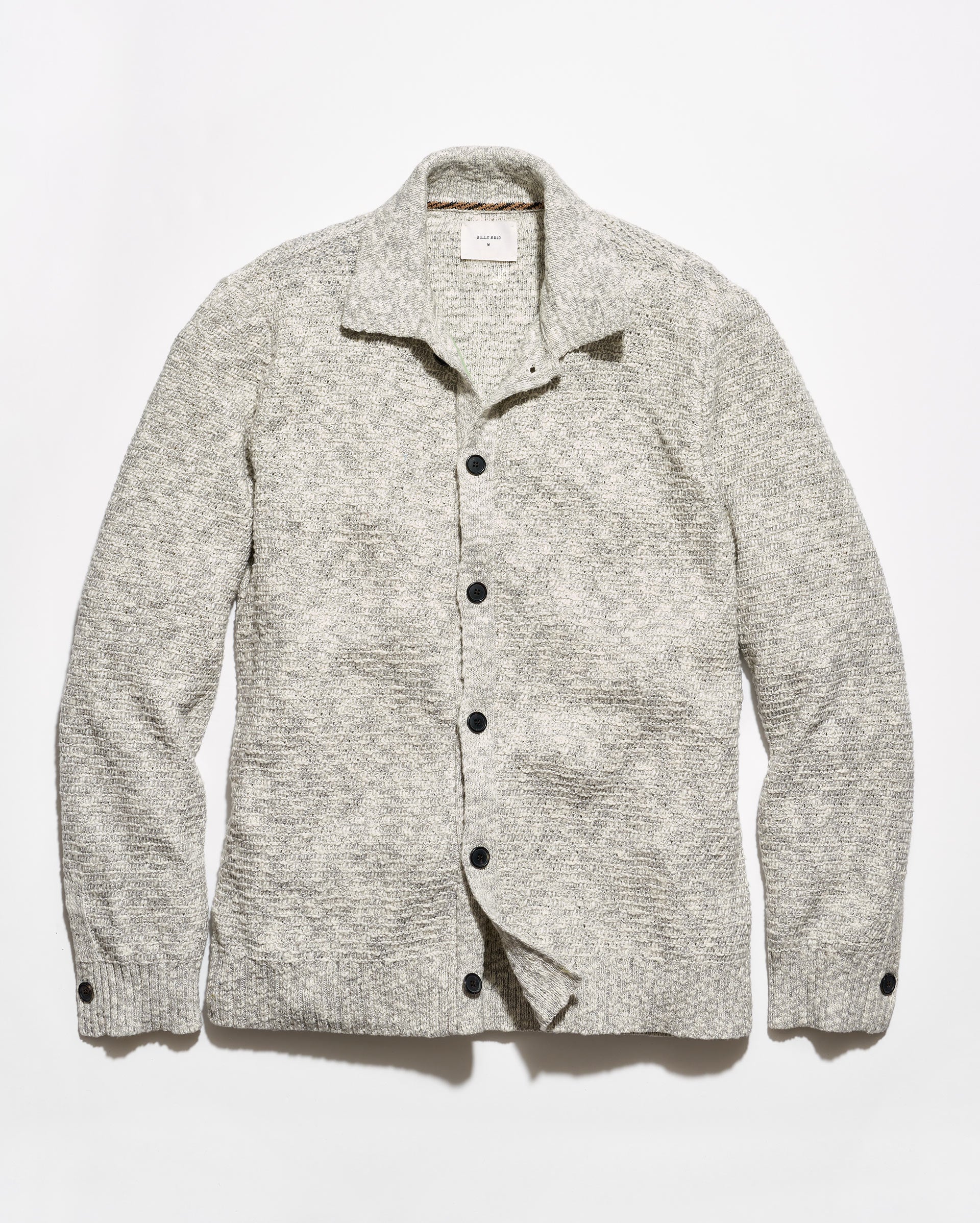 A light gray and white heathered knit cardigan sweater with a collar and dark buttons, laid flat against a white background.