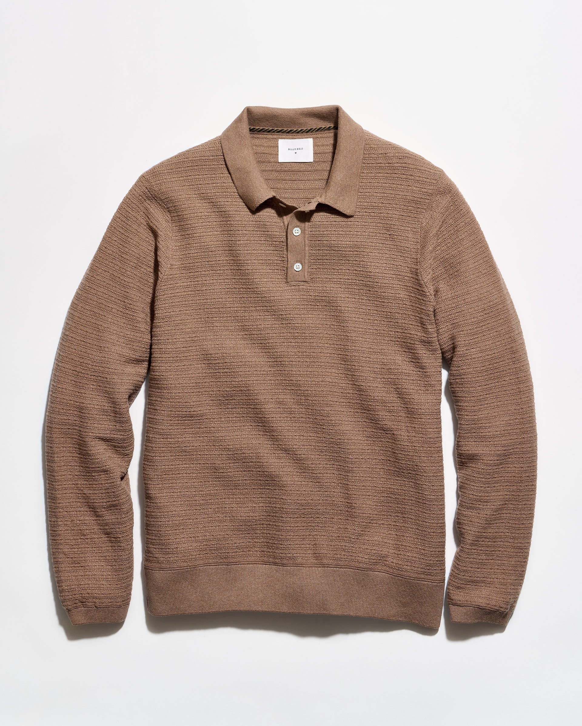 A brown textured knit polo sweater with a collar and two-button placket, laid flat against a clean white background.