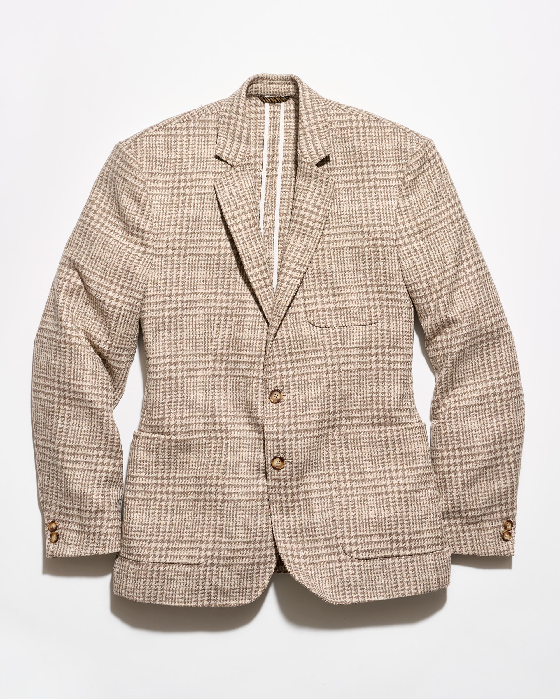 A beige and brown plaid blazer jacket with a two-button closure, displayed flat against a clean white background.
