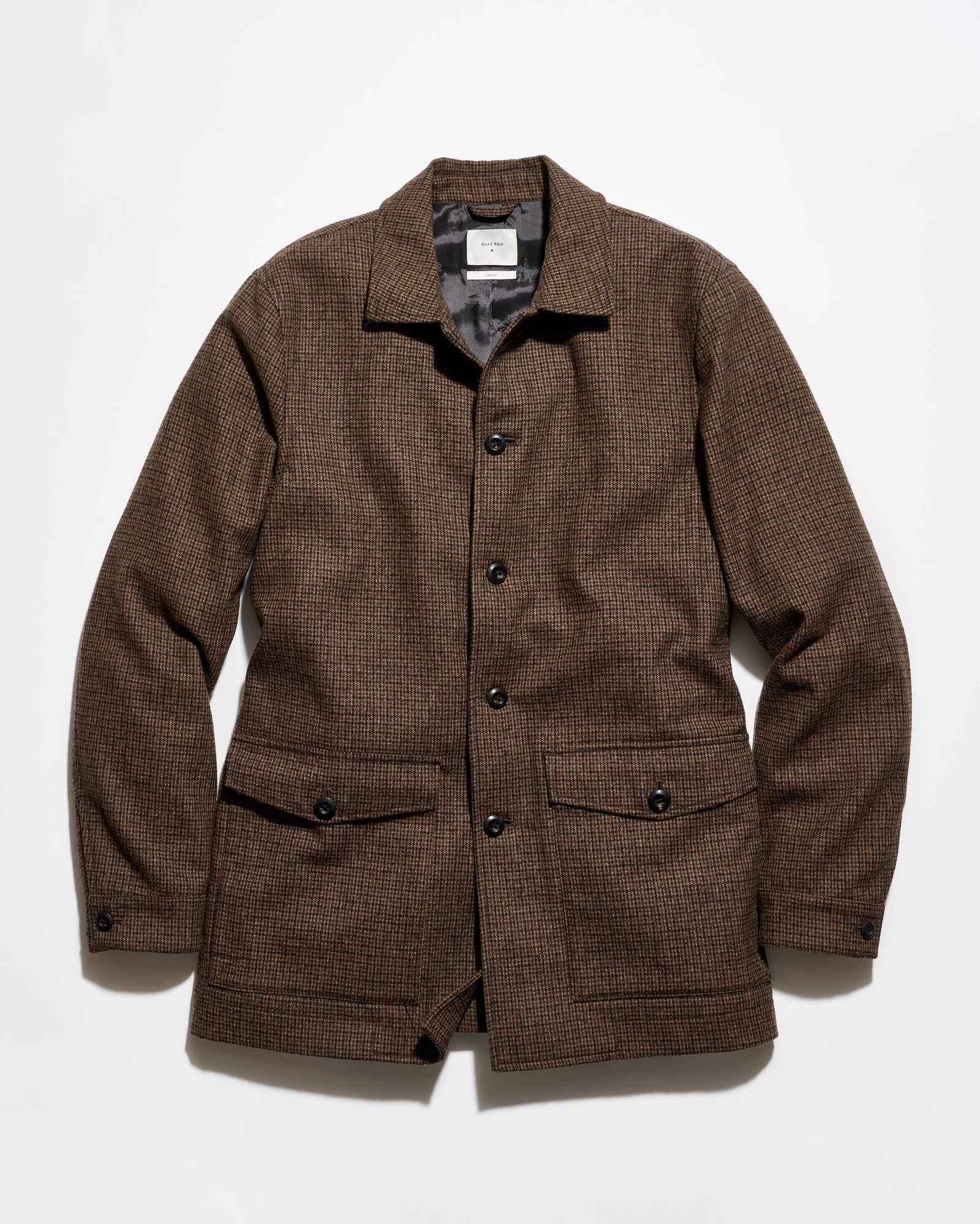 A brown textured tweed jacket with a button-up front, collar, and two front flap pockets, laid flat against a white background.