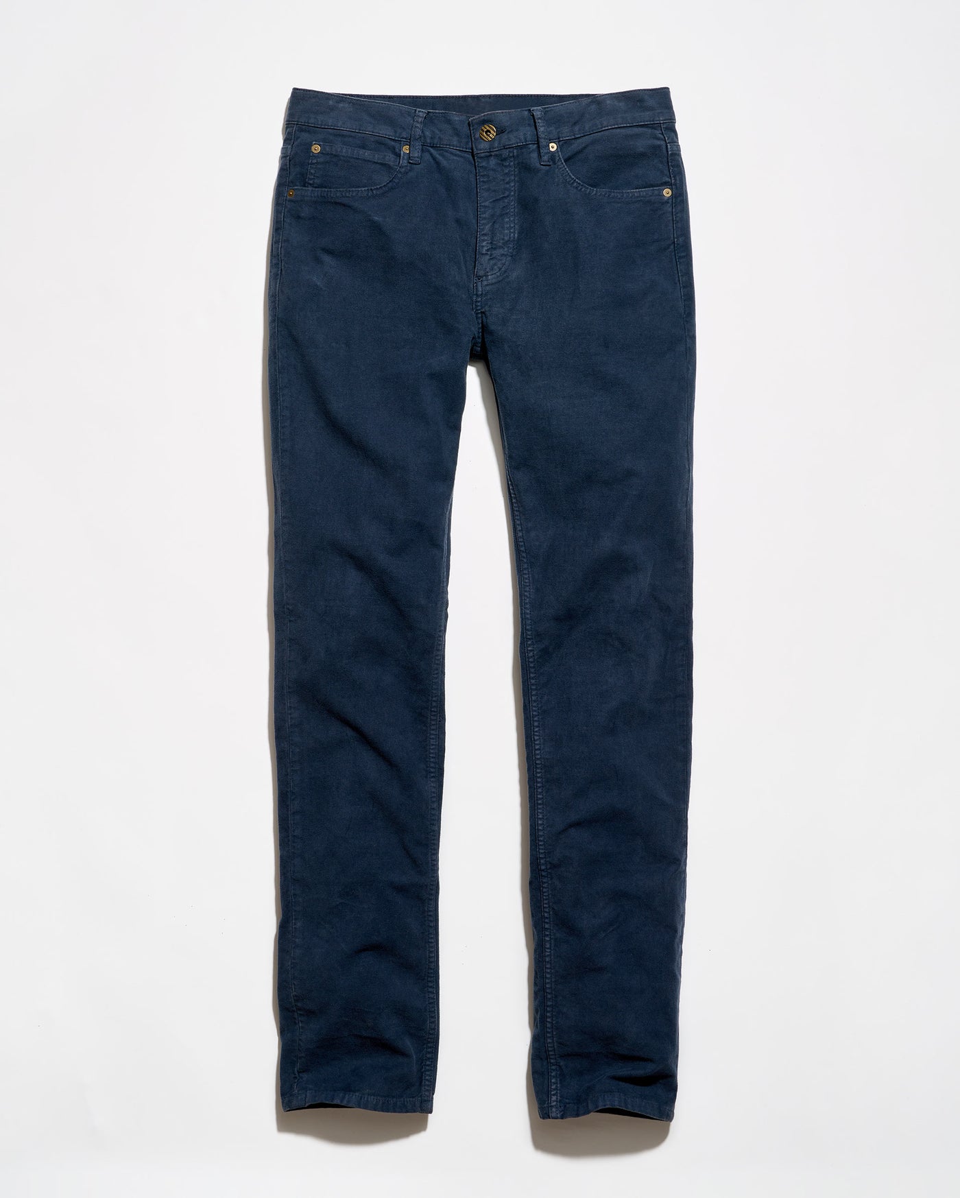 A pair of dark blue denim jeans laid flat against a clean white background.