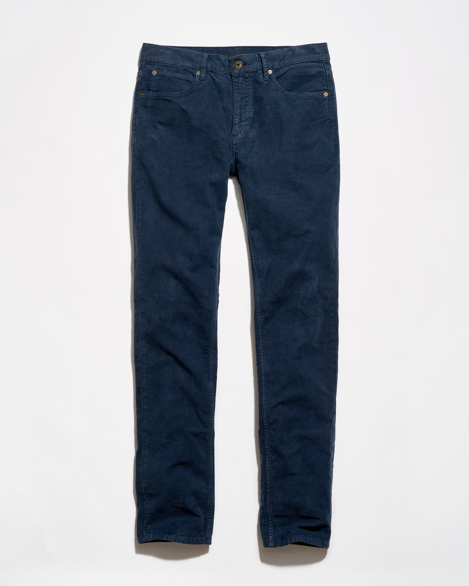 A pair of dark blue denim jeans laid flat against a clean white background.