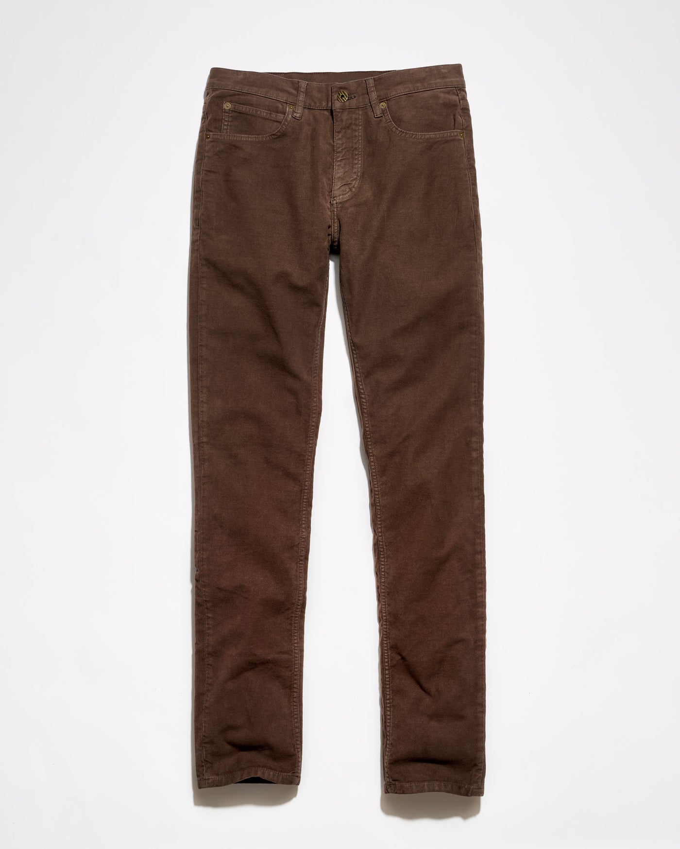 A pair of brown moleskin jeans laid flat against a clean white background.