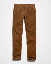 A pair of brown corduroy pants laid flat against a clean white background.