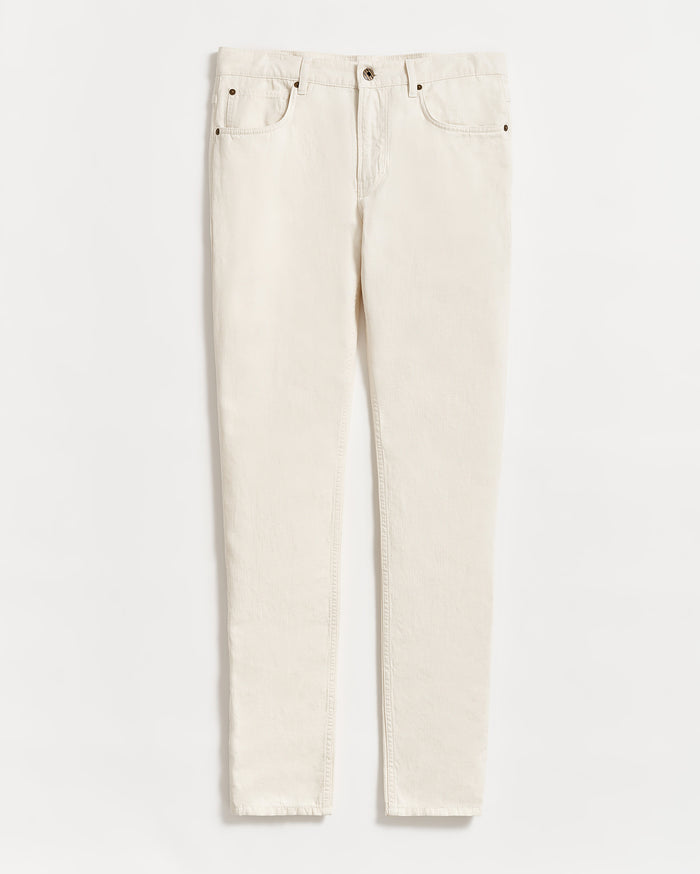 A pair of off-white, straight-leg jeans with a button and zip closure, front and back pockets, displayed flat on a white background.