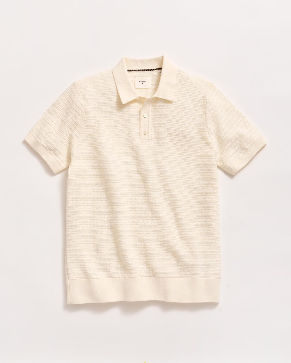 A short-sleeved, off-white knit polo shirt with a collar and a two-button placket, displayed flat against a plain white background.