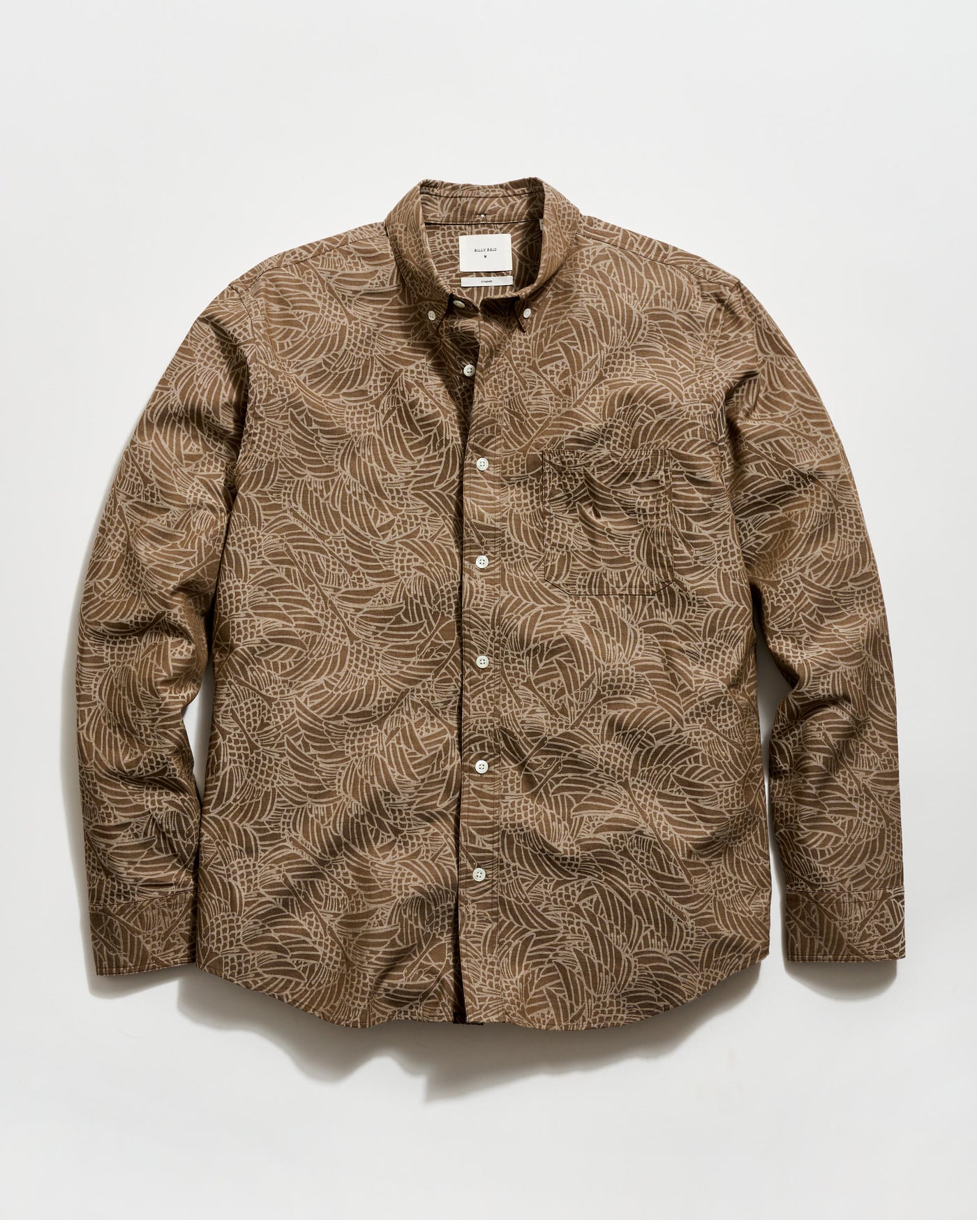 Brown patterned shirt on a white background