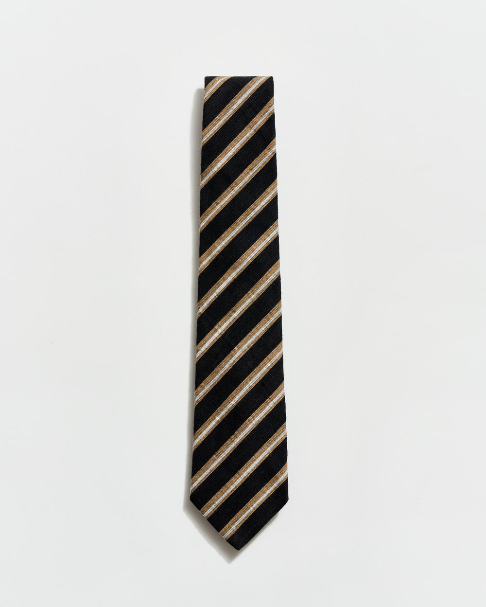 Black and beige striped tie on a light gray background