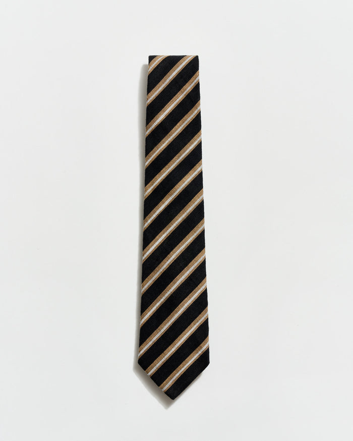 Black and beige striped tie on a light gray background
