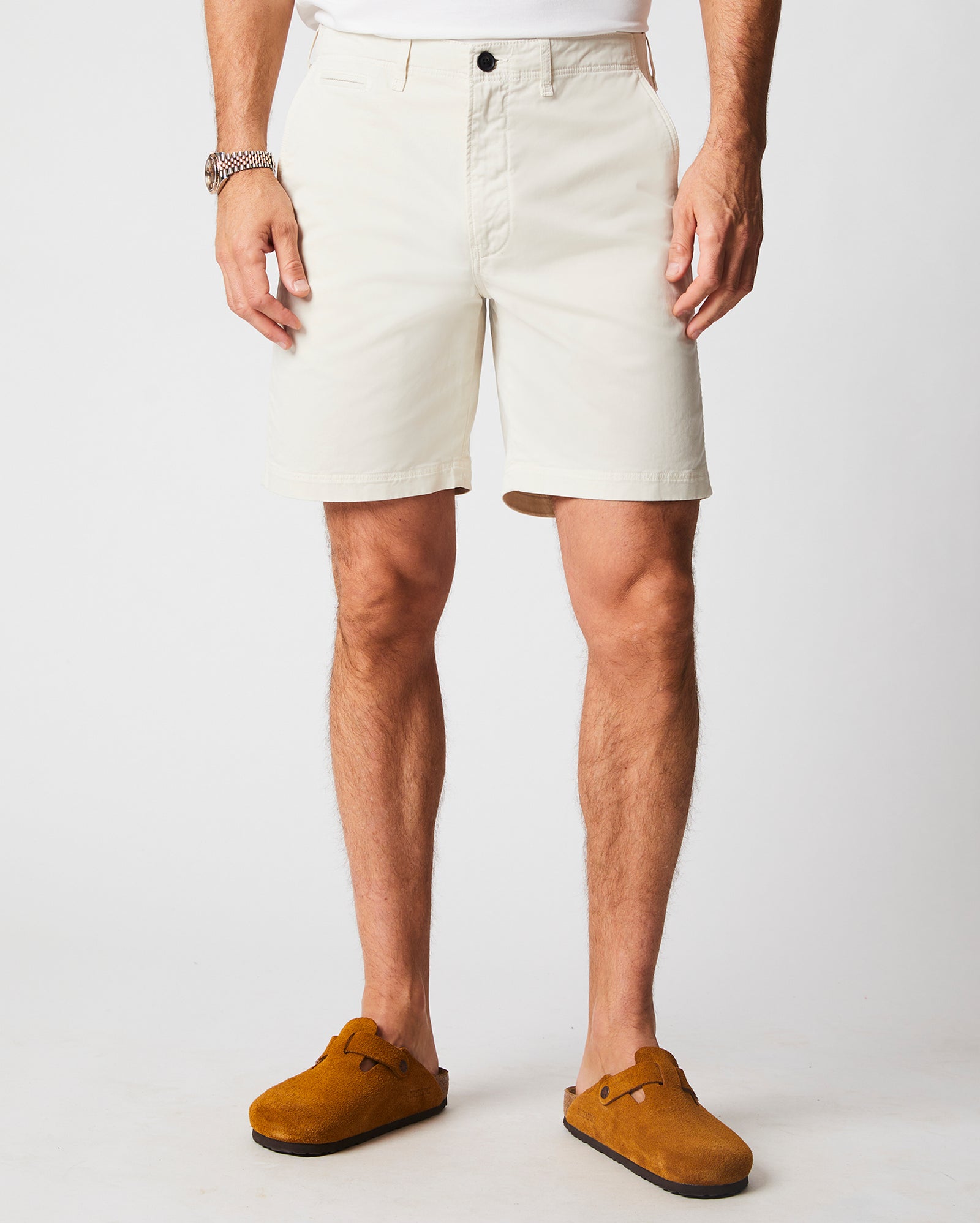 Male model wears the Chino Short in Eggshell